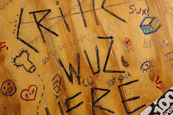 Critic Wuz Here: Theres a phone number inscribed on your desk and I called it.